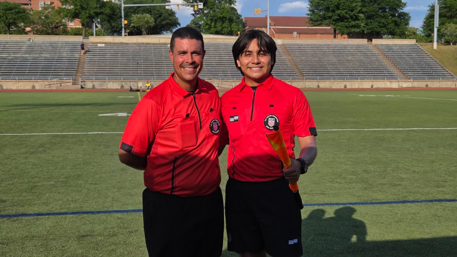 Alex with a fellow official